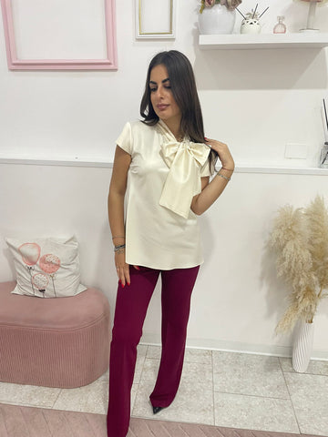 Blusa con fiocco