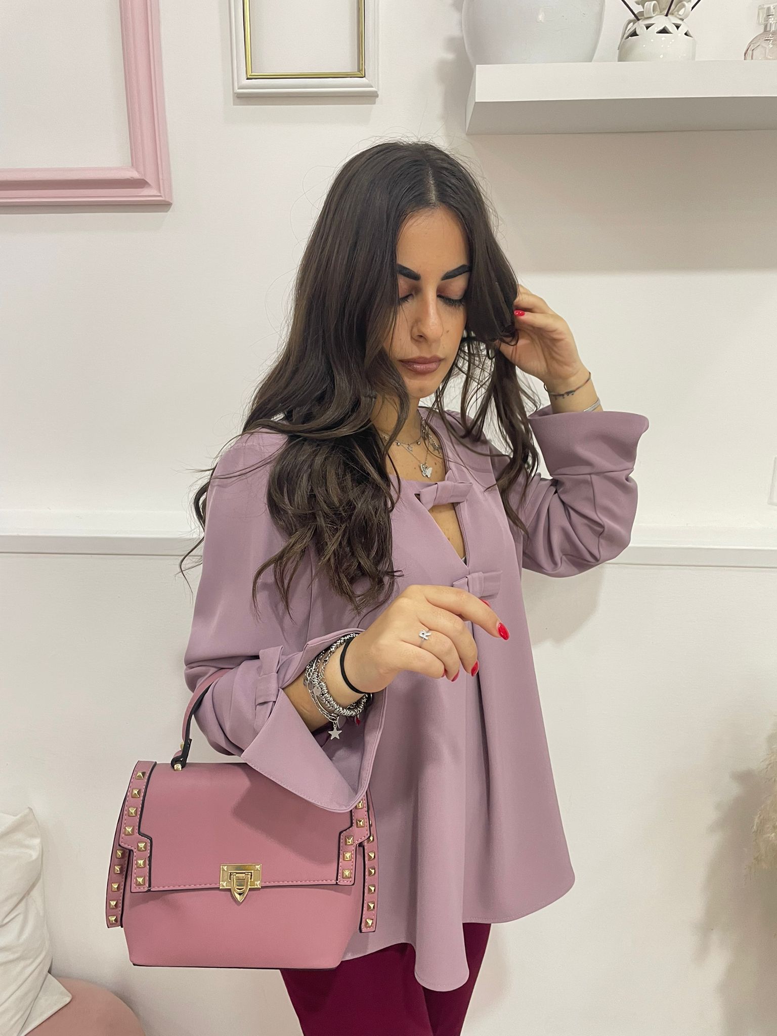 Blusa con fiocchi