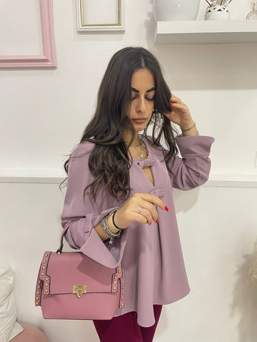 Blusa con fiocchi